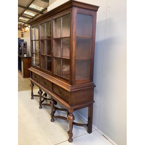 1033 - An early 20th century Dutch style walnut display cabinet, width 188cm, depth 44cm, height 180cm. Con... 