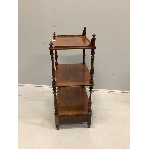 1061 - An early Victorian rosewood serpentine front three tier whatnot, width 50cm, depth 35cm, height 92cm... 