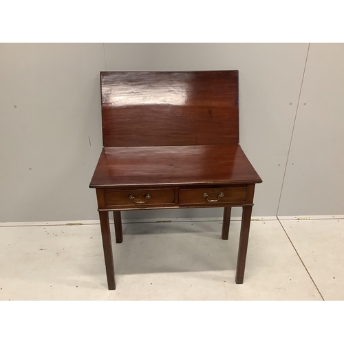 1064 - A George III rectangular mahogany two drawer folding tea table, width 83cm, depth 45cm, height 73cm.... 