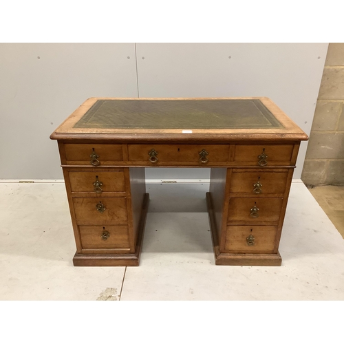 1083 - A late Victorian oak pedestal desk, width 106cm, depth 65cm, height 71cm. Condition - fair