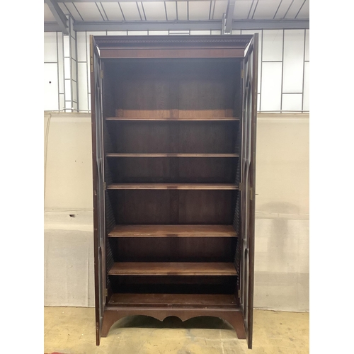 1096 - A George III style mahogany bookcase, width 116cm, depth 42cm, height 229cm. Condition - fair