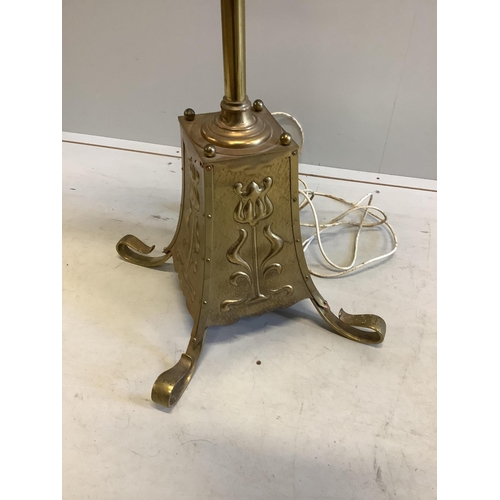 1099 - An early 20th century Arts and Crafts brass telescopic standard lamp. Condition - fair