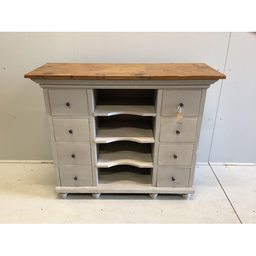 1100 - A painted pine eight drawer side cabinet, width 116cm, depth 43cm, height 97cm. Condition - fair to ... 