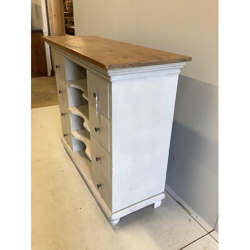 1100 - A painted pine eight drawer side cabinet, width 116cm, depth 43cm, height 97cm. Condition - fair to ... 