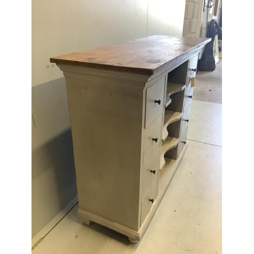 1100 - A painted pine eight drawer side cabinet, width 116cm, depth 43cm, height 97cm. Condition - fair to ... 