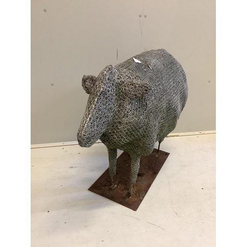 1118 - A Rupert Till wire work sculpture of a sheep on rectangular iron stand. Length 100cm, height 75cm. C... 