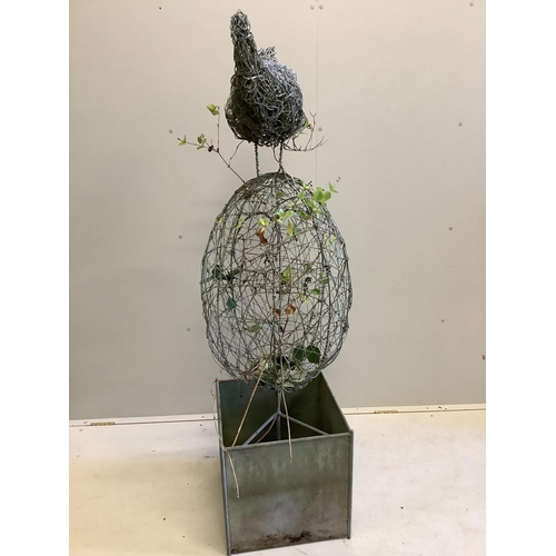 1119 - A Rupert Till wire work sculpture 'Chicken or Egg', on galvanised square trough base, height 164cm. ... 