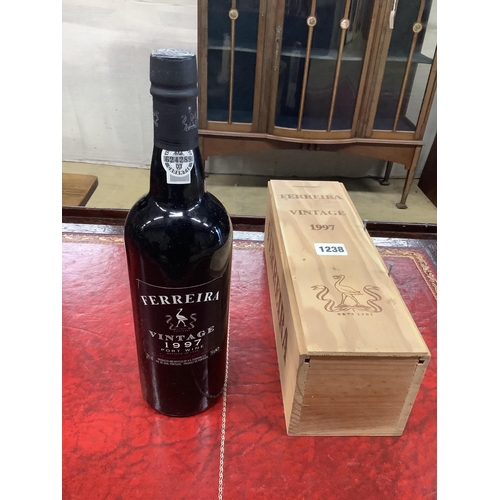 1238 - A bottle of Ferreira 1997 Vintage Port, O.W.C. (Surplus stock from a local wedding event company).... 