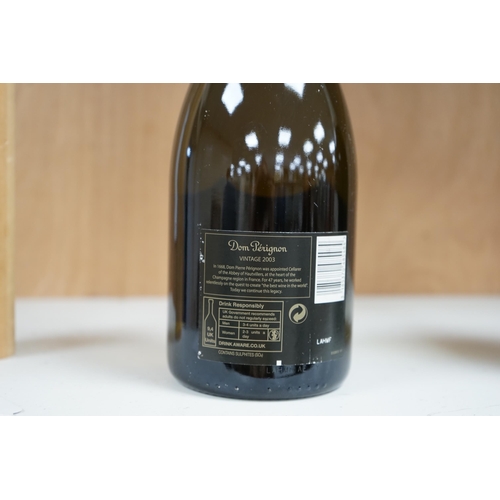 1251 - A 2003 vintage bottle of Dom Perignon champagne. Condition - fair to good, minor label wear, etc.... 