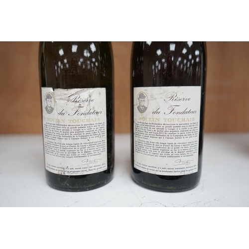 1253 - Two bottles of Moulin Touchais Anjou 1959 red wine. Condition - fair, staining to label, etc.