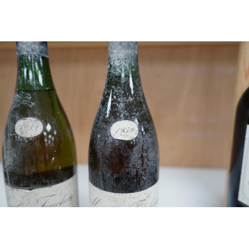 1253 - Two bottles of Moulin Touchais Anjou 1959 red wine. Condition - fair, staining to label, etc.