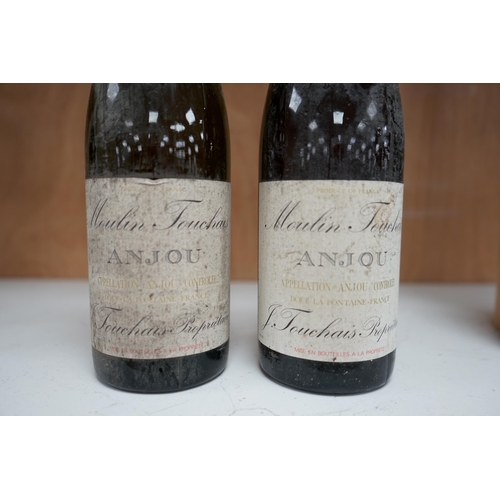 1253 - Two bottles of Moulin Touchais Anjou 1959 red wine. Condition - fair, staining to label, etc.