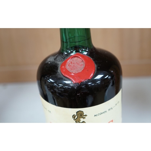 1259 - A bottle of Rocha's ruby port 1964. Condition - fair to good.