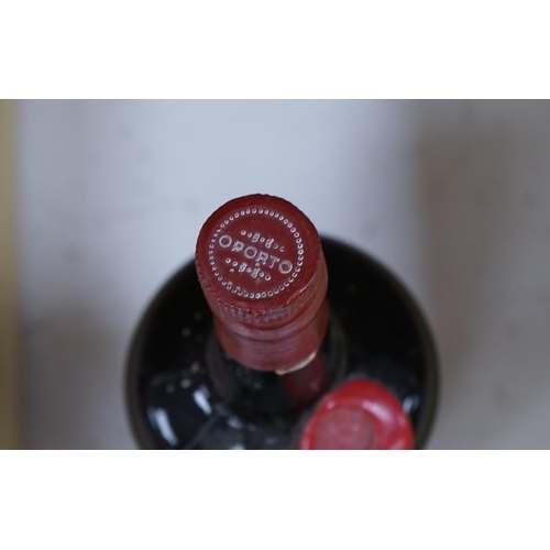 1259 - A bottle of Rocha's ruby port 1964. Condition - fair to good.