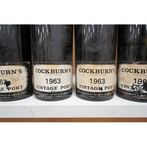 1262 - Four bottles of Cockburns 1963 vintage port. Condition fair, some wear to labels.