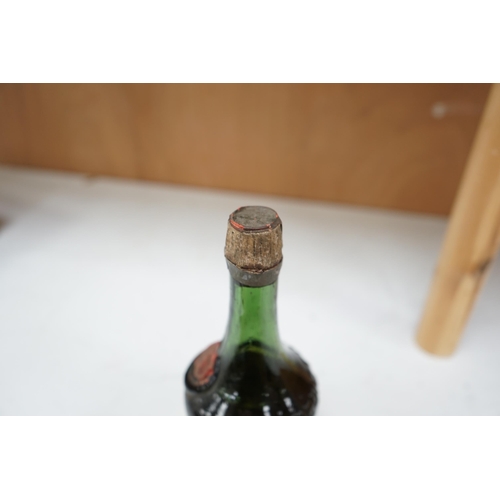 1263 - A bottle of Benedictine. Condition fair to good, label missing.