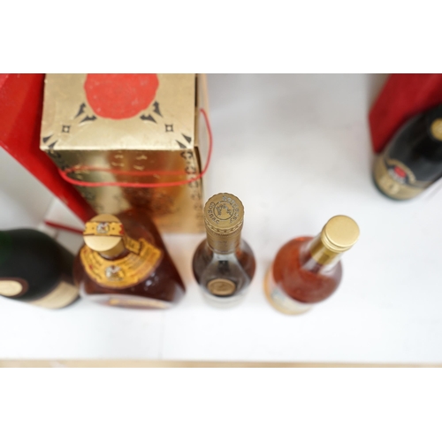 1274 - Four bottles of various alcohols comprising a bottle of 50cl Hennessey Fine Champagne Cognac,  Plant... 