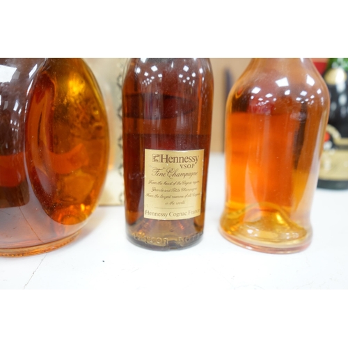 1274 - Four bottles of various alcohols comprising a bottle of 50cl Hennessey Fine Champagne Cognac,  Plant... 