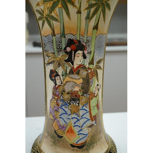 1293 - A 20th century Japanese Satsuma pottery trumpet vase decorated with figures, 32cm high. Condition - ... 