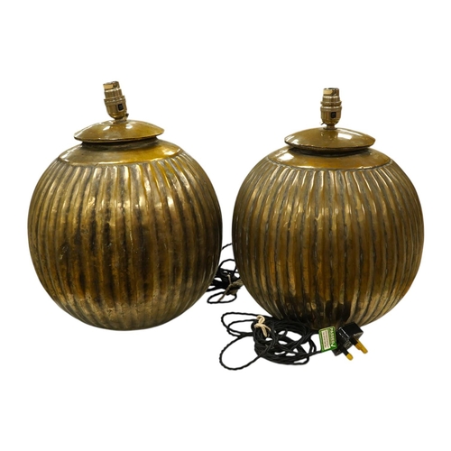 1296 - A pair of Indian globular bronzed metal table lamps, 36cm high overall. Condition - good, untested... 