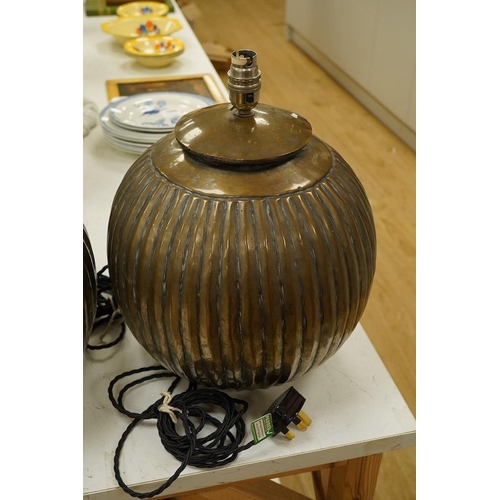 1296 - A pair of Indian globular bronzed metal table lamps, 36cm high overall. Condition - good, untested... 