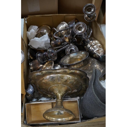 1299 - A quantity of assorted plated wares to include candelabra, wine coolers and pedestal dishes. Conditi... 