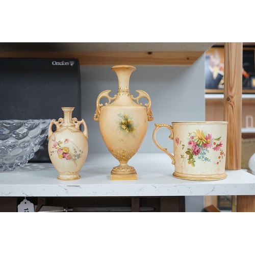 1303 - Three pieces of Royal Worcester; a mug, 11.5cm high, and two vases, tallest 22.5cm. Condition - good... 