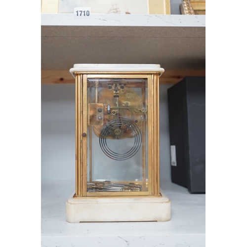 1305 - A Japanese four glass brass and alabaster mantel clock by Seikosha, with brocot type escapement and ... 