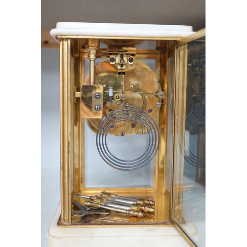 1305 - A Japanese four glass brass and alabaster mantel clock by Seikosha, with brocot type escapement and ... 