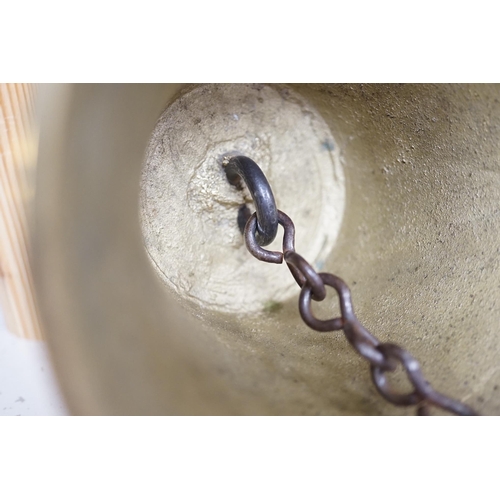 1306 - A late 19th/early 20th century brass school bell, with a turned mahogany handle, bell diameter 12.5c... 