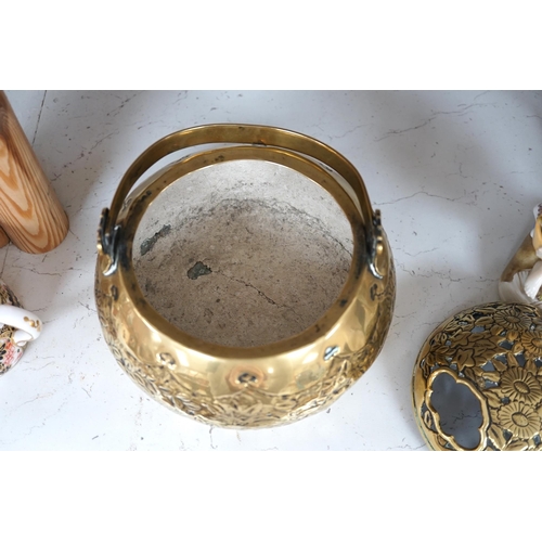 1309 - A Chinese brass basket censer and cover, 13cm high. Condition - fair.