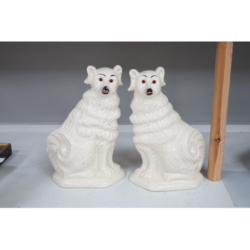 1319 - A pair of rare Staffordshire models of collies and a Victorian pottery models of a spaniel, tallest ... 