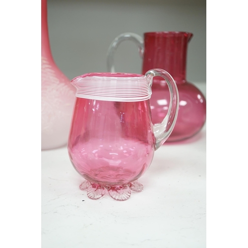 1326 - A pair of Victorian pink satin long necked vases, 25cm high, and five pieces of cranberry coloured g... 