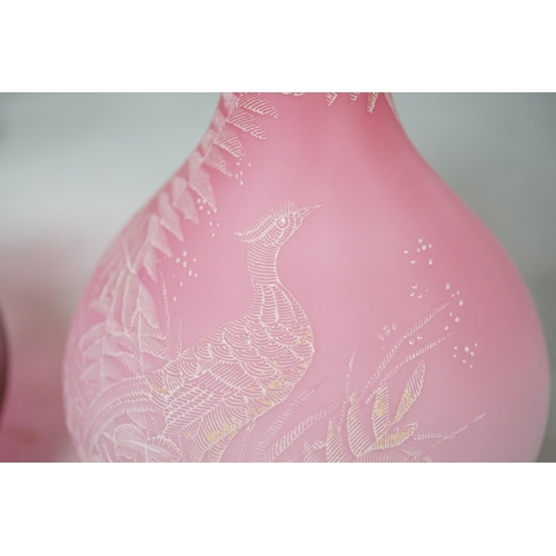 1326 - A pair of Victorian pink satin long necked vases, 25cm high, and five pieces of cranberry coloured g... 