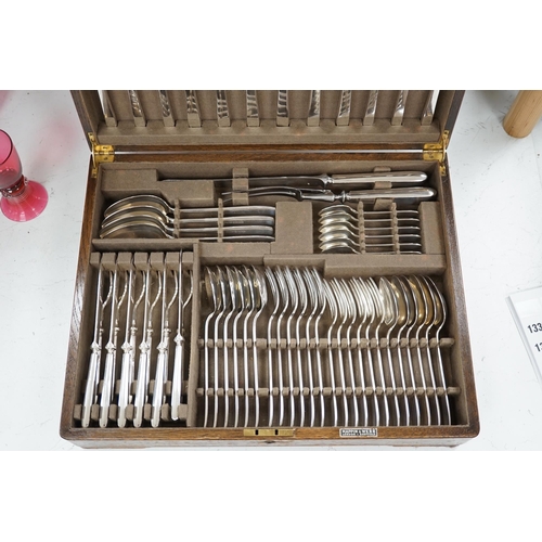 1327 - A Mappin and Webb oak canteen of silver plated cutlery, case 44 x 35 x 11cm. Condition fair to good,... 