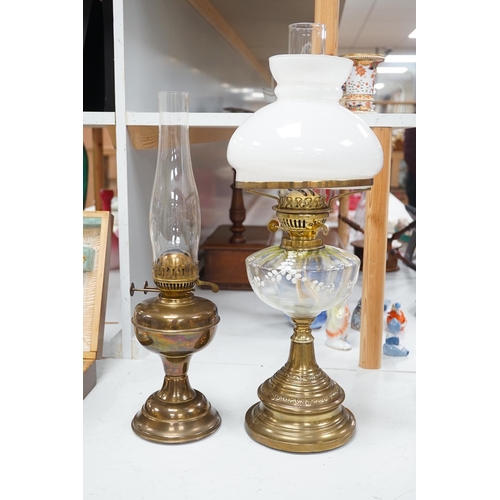 1330 - A late 19th century brass oil lamp with painted bowl and opaque shade together with a later oil lamp... 