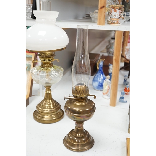 1330 - A late 19th century brass oil lamp with painted bowl and opaque shade together with a later oil lamp... 