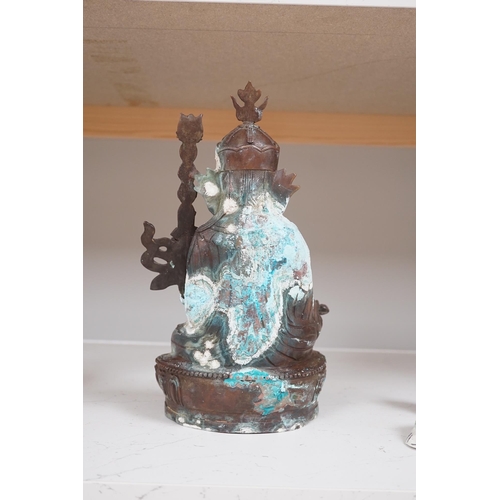 1345 - A Tibetan bronze Padmasambhava Buddhist figure, 29.5cm high. Condition - poor to fair.