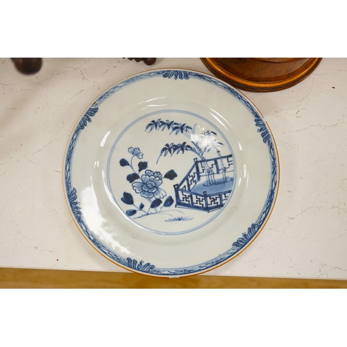 1348 - A Chinese blue and white plate, a tea bowl, two pottery bowls and a wooden stand (5). Condition - fa... 