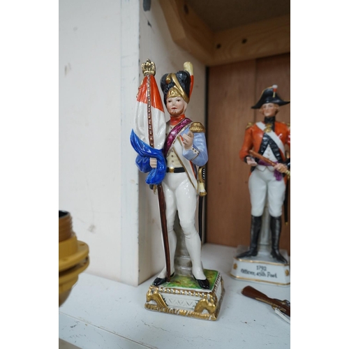 1351 - Four Continental porcelain figures wearing military dress including Napoleon and Officer, 45th Foot,... 