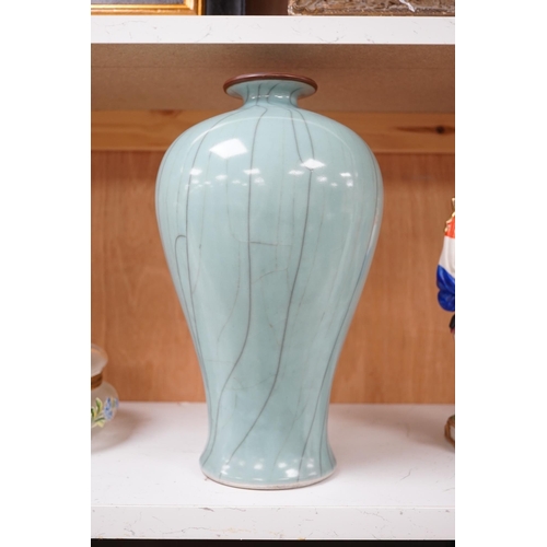 1352 - A Chinese celadon and crackle glazed pottery vase, incised mark to base, 32cm. Condition - good... 