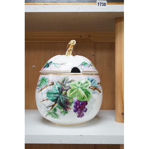 1354 - A Paris porcelain grape and vine painted punch bowl and cover, 27cm high. Condition - fair to good.... 