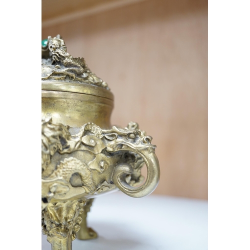 1355 - A Chinese bronze lidded censer, with jade bead insert in the finial, 15cm high. Condition - good.... 