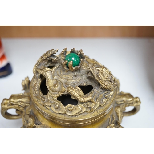 1355 - A Chinese bronze lidded censer, with jade bead insert in the finial, 15cm high. Condition - good.... 