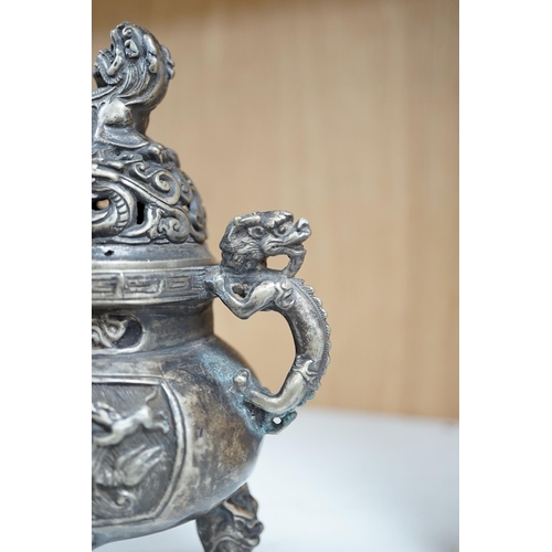 1357 - A Chinese silvered bronze lidded dragon censer, 16cm tall. Condition - fair to good