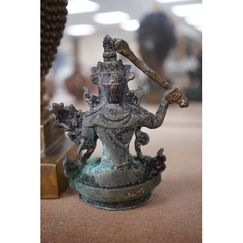 1390 - A large Buddhist head seal and seated figure of Tara, largest 19cm high. Condition - fair