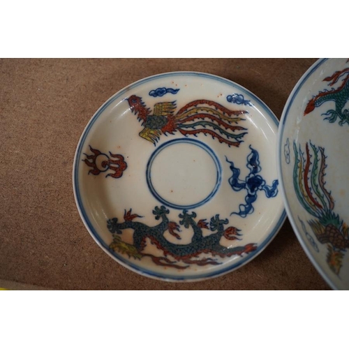 1393 - A pair of Chinese pedestal cups and three saucers. Condition - one cup severely damaged