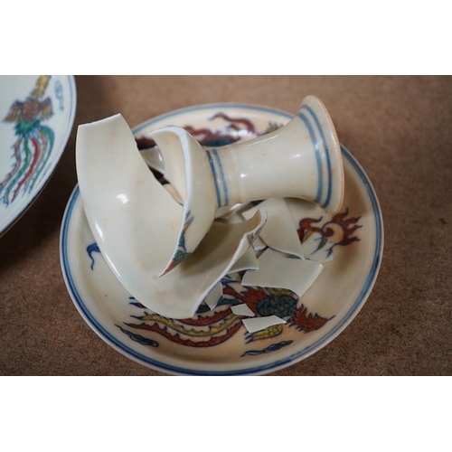 1393 - A pair of Chinese pedestal cups and three saucers. Condition - one cup severely damaged