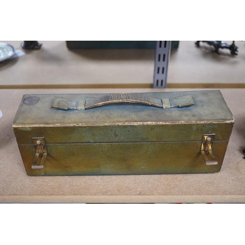 1395 - A green leather sectioned box containing a collection of cut glass, silver mounted and silver plated... 