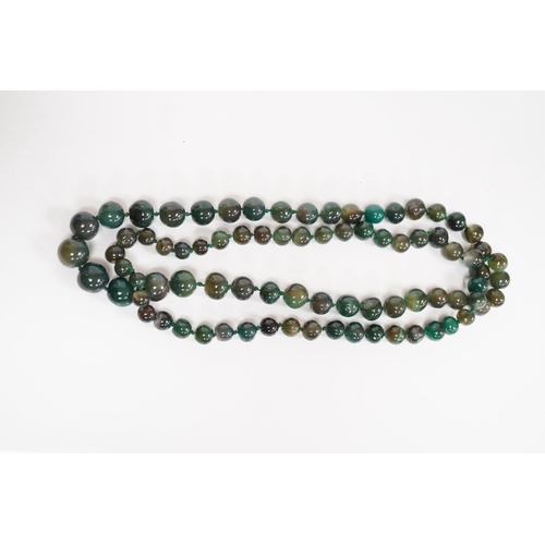 1410 - An early 20th century hardstone beaded necklace. Condition - fair